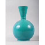 A Continental? green glazed monochrome vase, 9 1/2" high
