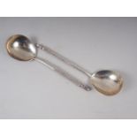 A pair of Russian silver serving spoons with spiral twist handles, 3.3oz troy approx