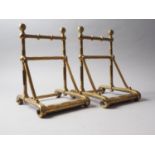 A pair of 19th century Aesthetic Movement turned brass fire implement rests, 11 1/2" high