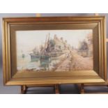 J Hughes Clayton: watercolours, Cornish coastal village with fishing boats and figures, 12 1/2" x