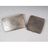 Two engine turned silver cigarette cases, 9.1oz troy approx