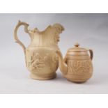 A 19th century sprig decorated drabware jug with monkeys, 9" high, and a stoneware teapot