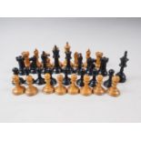 A standard size chess set with one extra black piece, in mahogany box, and another boxed chess set