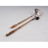 A Queen Elizabeth II 1977 silver double lipped punch ladle and a silver candle snuffer, with