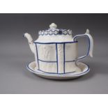 An early 19th century Castleford porcelainous teapot with sprigged decoration and repaired spout,