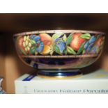 A Maling ware lustre decorated bowl with fruit decoration, 9" dia, a leaf decorated stein, four