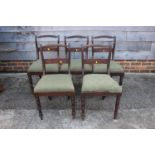 A set of five 19th century mahogany bar back standard dining chairs with rope twist top rails and