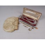 A 9ct gold bar brooch set seed pearls and garnet, a dress ring set brilliants, a crystal necklace,