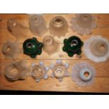 An assortment of Victorian and later glass lampshades, including three opalescent examples and a