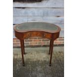 A mahogany kidney-shape desk with tooled lined top, fitted one drawer, on square taper supports, 30"