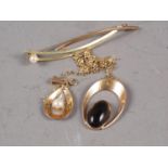 A 9ct gold bar brooch set seed pearl, a 9ct gold fine link chain, a 14ct gold and seed pearl set