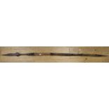 An African spear with steel point and hidebound shaft, 68" long