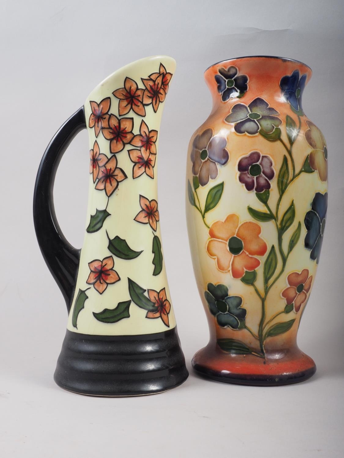 A baluster vase labelled "Crown Ducal Charlotte Rhead" , and a similar jug,