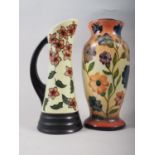 A baluster vase labelled "Crown Ducal Charlotte Rhead" , and a similar jug,