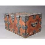 A Hanseatic pine and brass bound strong box with scrollwork mounts and carry handles, 17" wide x