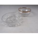 A cut glass fruit bowl with silver rim and a similar 1950s cut glass bowl, 8" dia