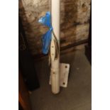 A wall mounted flagpole and accessories, pole 120" long