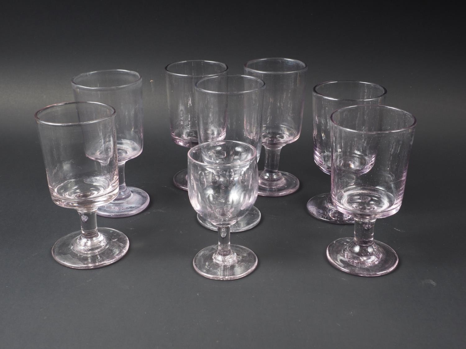 A set of seven 19th century glass goblets and a smaller similar wine