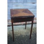 A walnut and line inlaid envelope top card table, fitted one drawer, on square taper supports, 19"