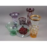 A cranberry and clear cut glass vase, 12 1/4" high, another smaller similar, four other glass