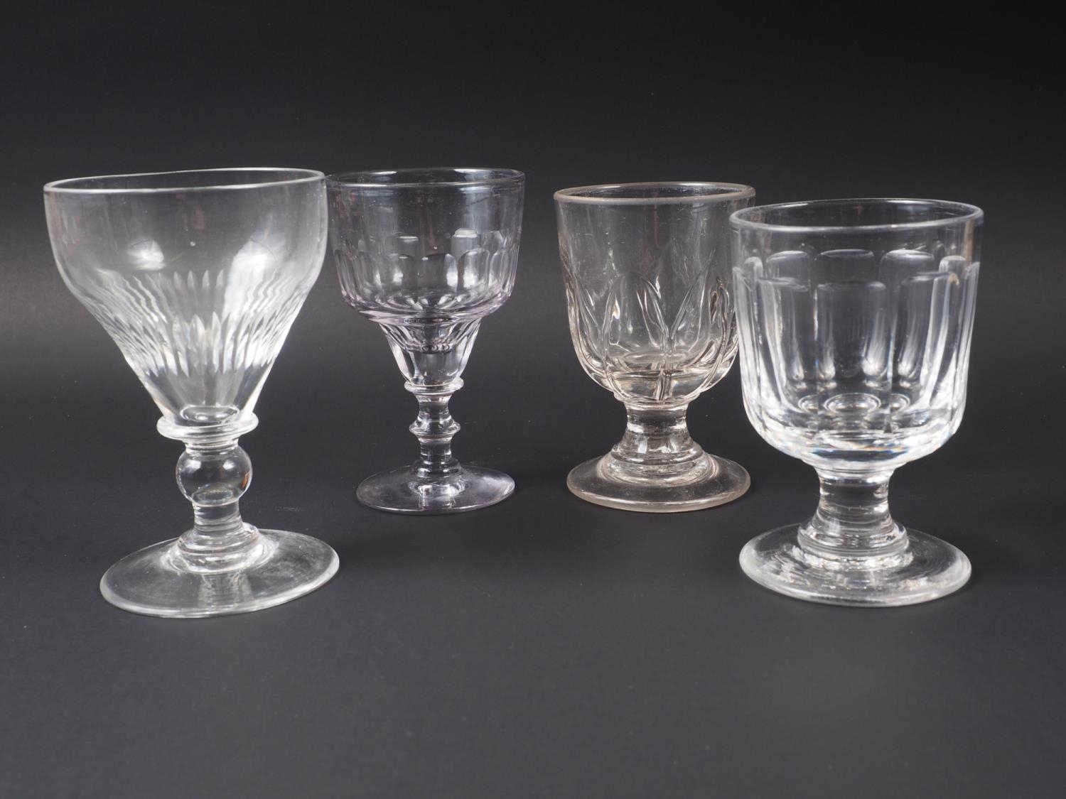 Two 19th century cut glass rummers, a blow moulded glass goblet and an ogee bowl rummer