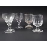 Two 19th century cut glass rummers, a blow moulded glass goblet and an ogee bowl rummer
