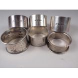 A pair of silver napkin rings and four other assorted silver napkin rings, 5.2oz troy approx