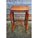 An Edwardian walnut two-tier shape top occasional table, on cabriole supports, 17" wide x 12" deep x