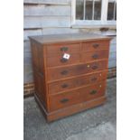 A late 19th century oak chest of four short and three long graduated drawers, on later castored