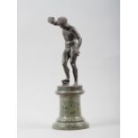 A grand tour patinated bronze figure of the Medici faun (cymbal player), 7" high, on marble base, 4"