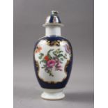 An 18th century Worcester oviform tea caddy with reserved floral panels on a blue scale ground