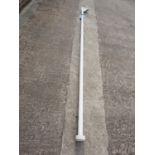 A wall mounted flagpole and accessories, pole 120" long