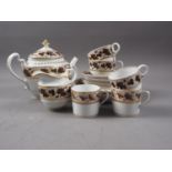 A Worcester Flight & Barr part tea service with bands of sepia grapes and gilt decoration (hair