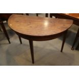A 19th century mahogany semicircular side table, on square taper supports, 44" wide x 22" deep x