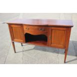 A mahogany and banded break bowfront sideboard, fitted one drawer and two cupboards enclosed