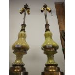 A pair of Continental brass and glass baluster table lamps and shades, 30" high