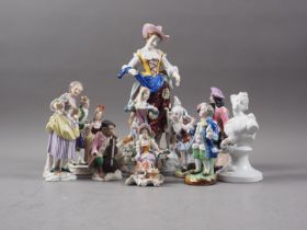 A pair of 19th century Continental figures in period costumes, 5" high, and a shepherdess, 10" high,