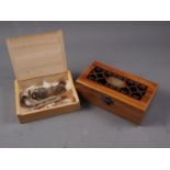 A dalbergia Raffles Hotel tea box with pierced decoration, 7 3/4" wide (damages), various pipe