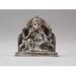 An Indian patinated brass figure of a Ganesh, 5 3/4" high