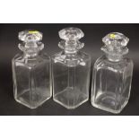 A set of three 19th century cut glass spirit decanters, 10" high