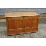 A Georgian oak four-panel front coffer with faux drawers, on stile supports, 50" wide x 22 1/2" deep
