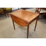 A late 19th century mahogany Pembroke table, fitted one drawer, on square taper supports, 29" wide x