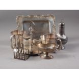 A rectangular silver plated tray, two plated pint mugs, a plated cruet stand and other plated items