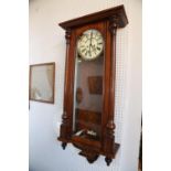 A late 19th century walnut cased Vienna type regulator wall clock, 41" high (no pendulum)