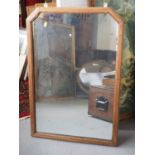 A 1930s oak rectangular framed wall mirror with cut corners, plate 29" x 19"