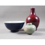 A Chinese flambe glazed baluster vase, 8" high, a Chinese porcelain blue glazed bowl with seal