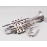 A Besson silver plated trumpet, in black and brown leather carry case