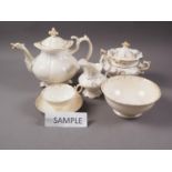An early 19th century bone china gilt decorated part teaset