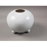 A Chinese bulbous crackle glazed vase, on three bun feet, 6 1/4" high