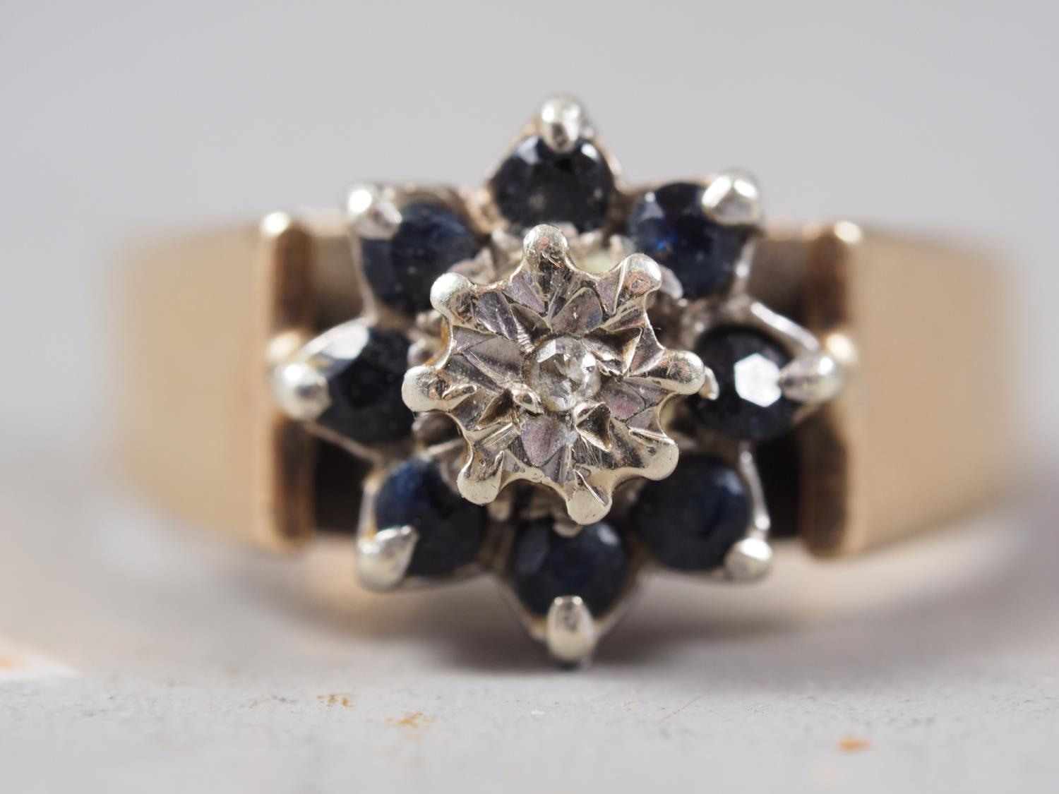 A 9ct gold, diamond and sapphire dress ring, size J, 1.9g, a 9ct gold, diamond and ruby crossover - Image 2 of 3